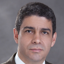 Prof. CARLOS OSPINA