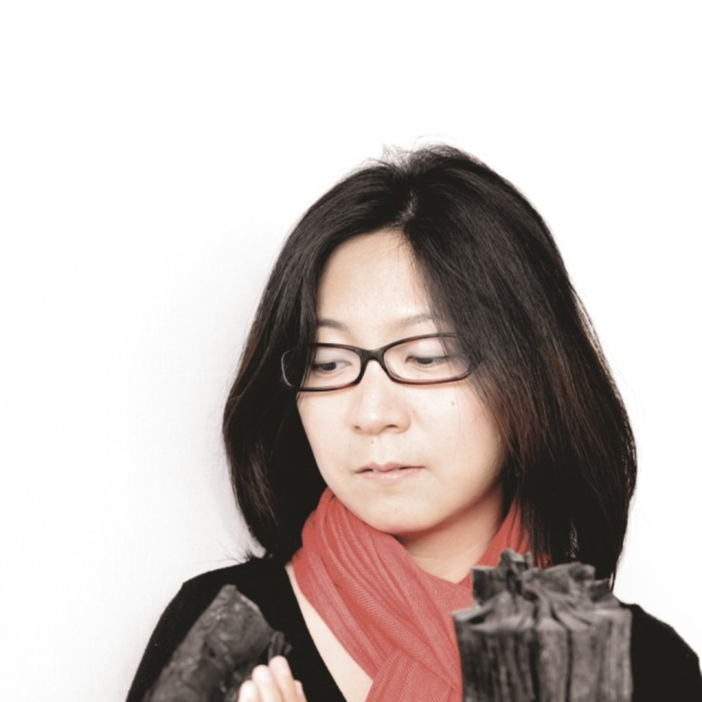 Xiaoyi GU Senior communication designer, Director business