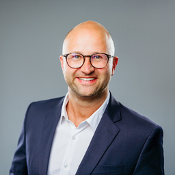 Dr. Tim Komkowski