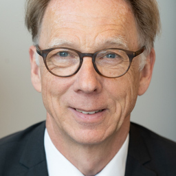 Dr. Axel Henriksen