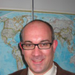 Dr. Roland John