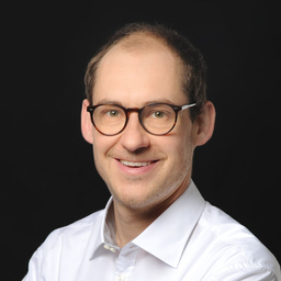 Dr. Constantin Huesker