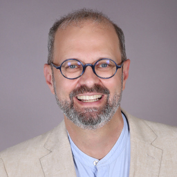 Dr. E. JAMES GAY