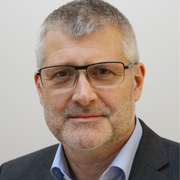 Dr. LASZLO GREINER