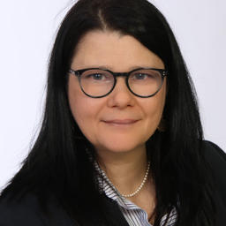 Dr. Evelyne GONIA