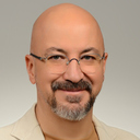 Dr. Kamil AHAT